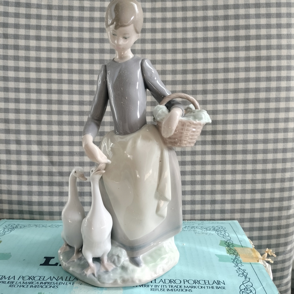 Porcelain Figurine with Basket and Geese
